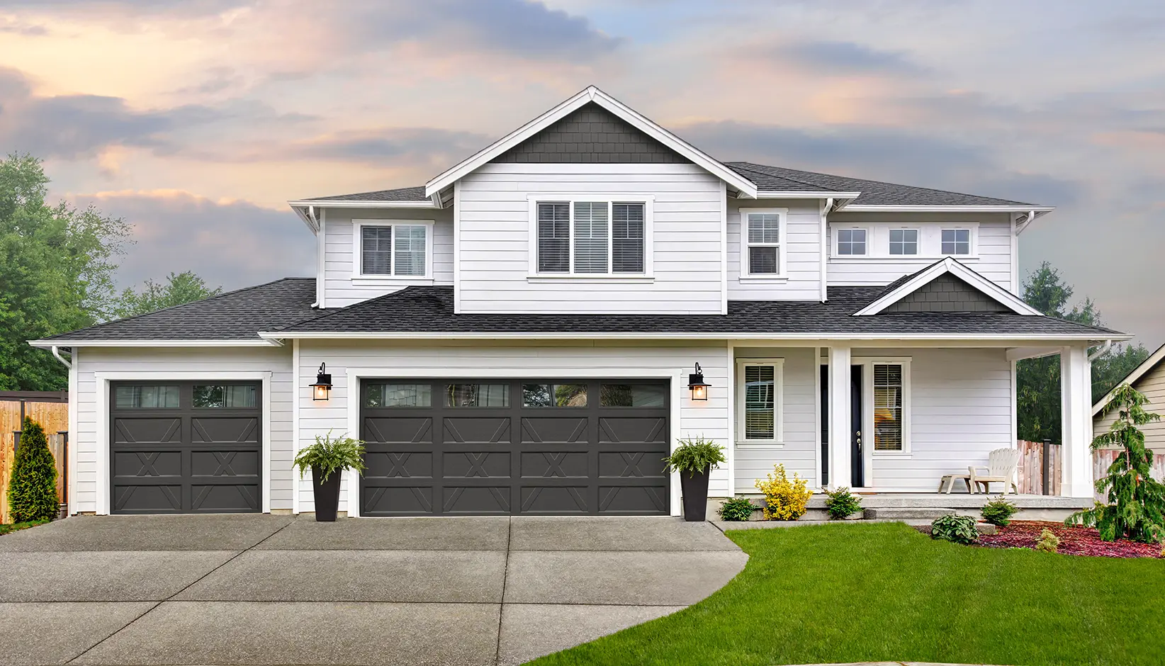 Bridgeport™ Inlay garage door in Design X with plain long windows in Iron Ore