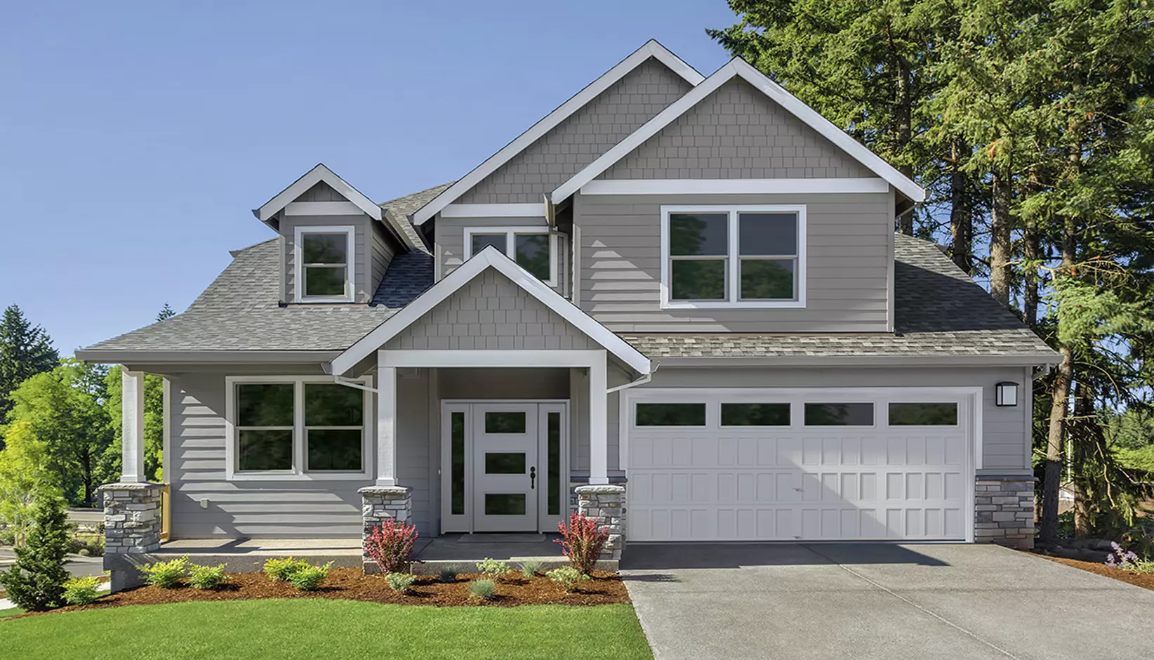 Bridgeport Steel garage door with narrow recessed panels with plain long windows in white