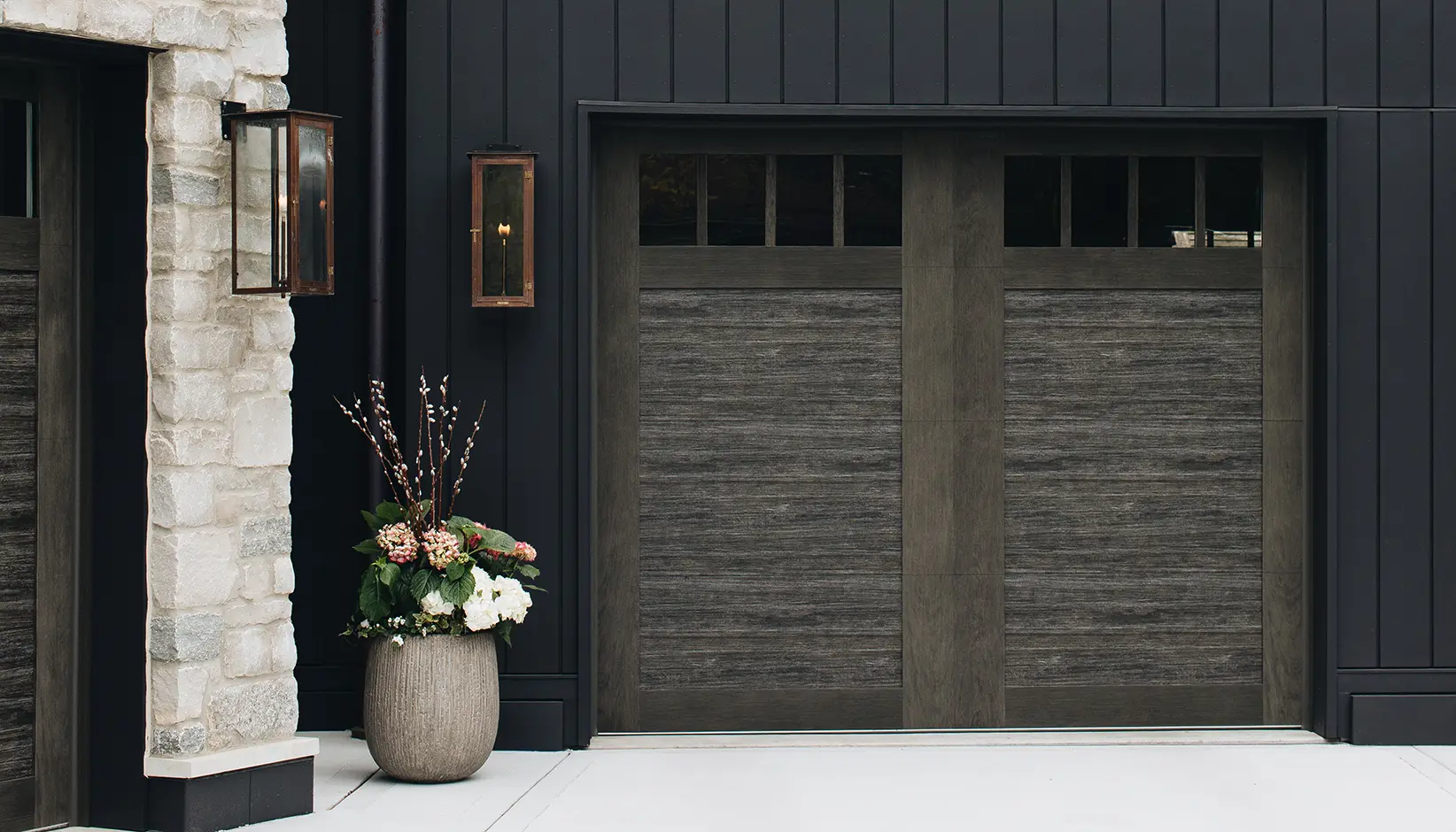 Canyon Ridge® 4-Layer garage door in Design 11 with REC14 windows in Ultra-Grain® Cypress Slate Finish