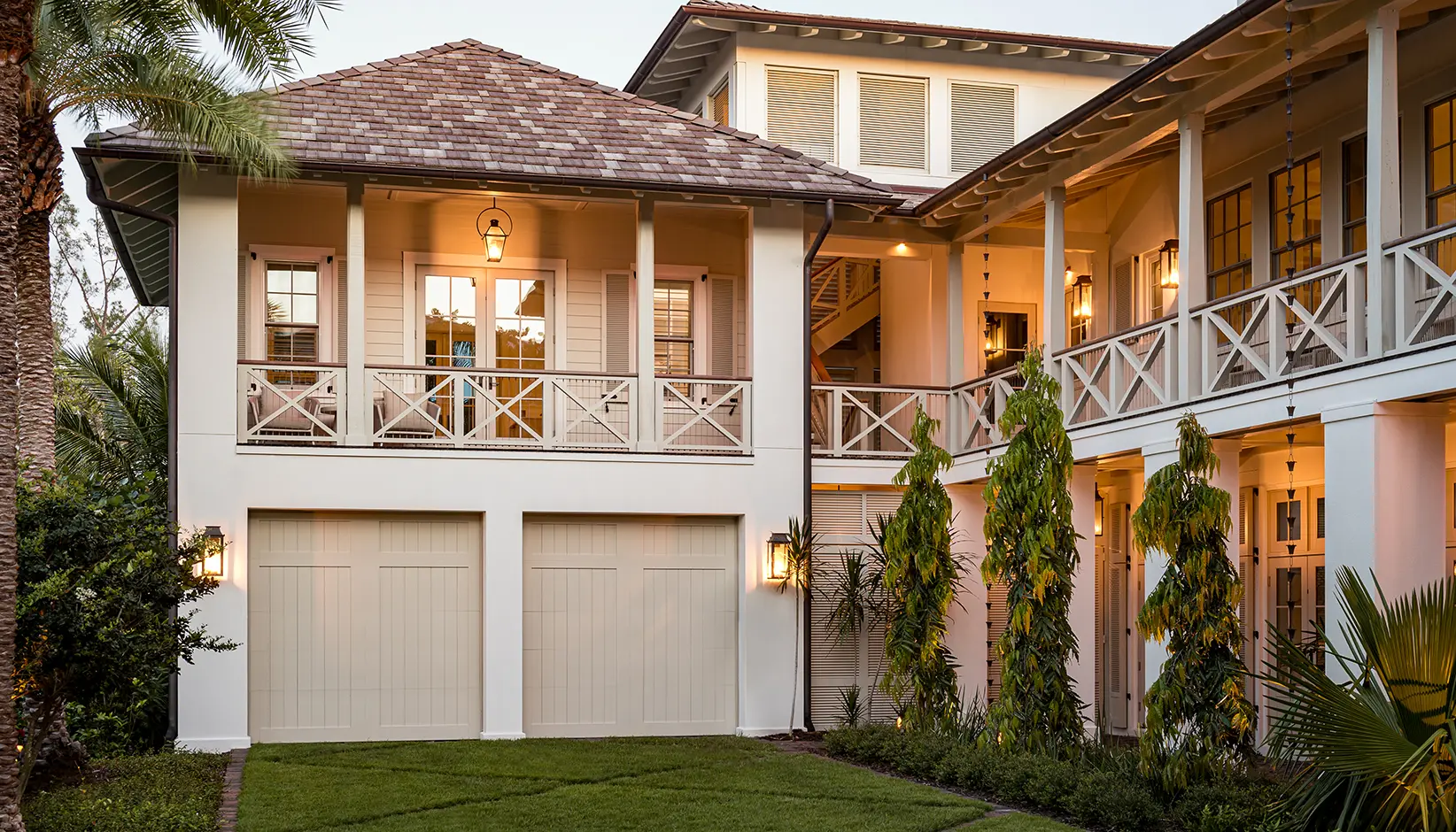 Canyon Ridge® 5-Layer garage door in Design 11 with TOP11 solid top section in custom color